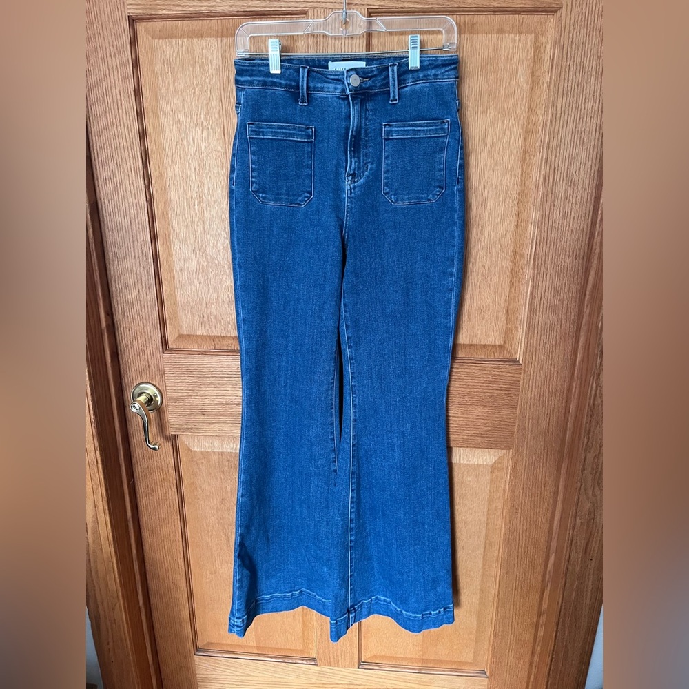 Risen high rise, super flare leg Jeans with patch pockets